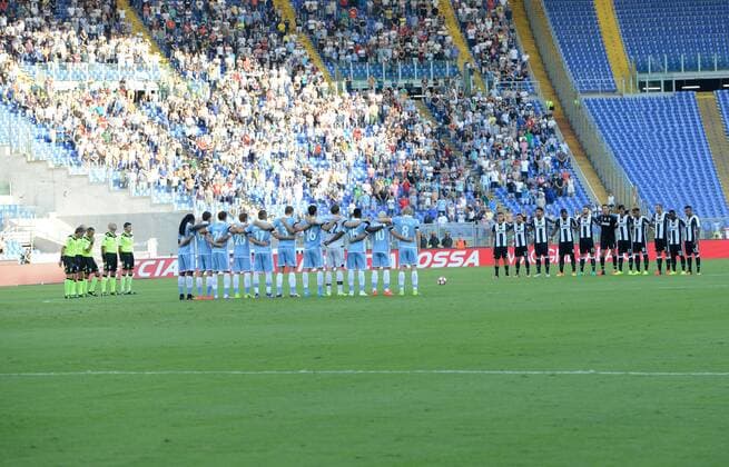 August 27, 2016 - Rome, Italy - F.C. Juventus and S.S. Lazio deployed in midfield in memory of the victims of the earthquake in Italy Centre during the Italian Serie A football match between S.S. Lazio and F.C. Juventus at the Olympic Stadium in Rome, on august 27, 2016. SS Lazio v Juventus FC - Serie A  - ZUMAn230