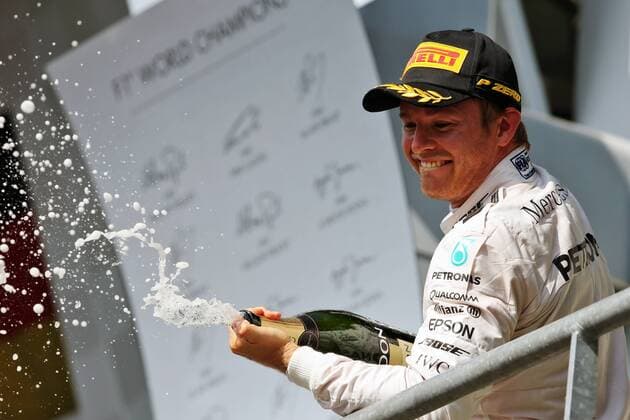 Formel 1, GP von Belgien, Sieger Nico Rosberg Belgian Grand Prix, Spa Francorchamps 25 - 28 August 2016 Race winner Nico Rosberg (GER) Mercedes AMG F1 celebrates with the champagne on the podium. 28.08.2016. Race 