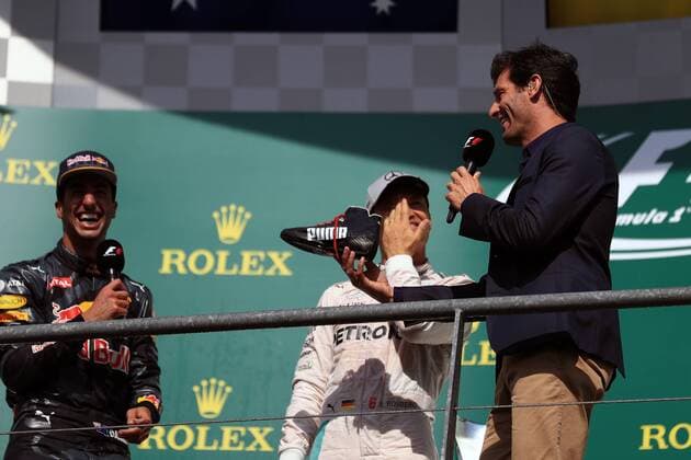 28.08.2016. Spa-Francorchamps, Belgium. F1 Grand Prix of Belgium, Race Day. Red Bull Racing - Daniel Ricciardo shares his champagne from his racing shoe with Mark Webber xLeannexBoonx  ActionPlus11780964