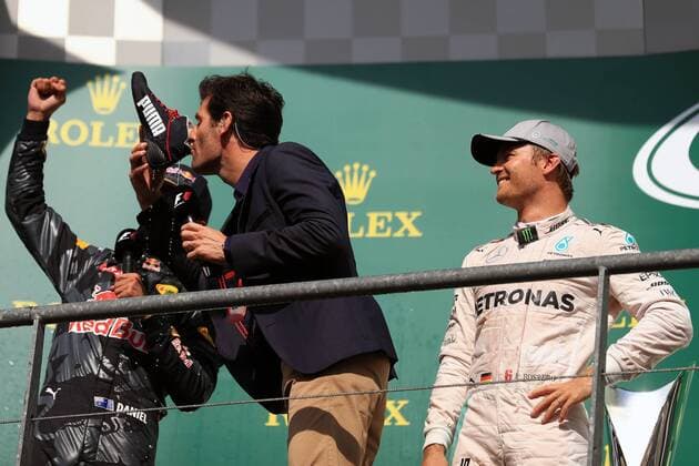 28.08.2016. Spa-Francorchamps, Belgium. F1 Grand Prix of Belgium, Race Day. Red Bull Racing - Daniel Ricciardo shares his champagne from his racing shoe with Mark Webber xLeannexBoonx  ActionPlus11780968