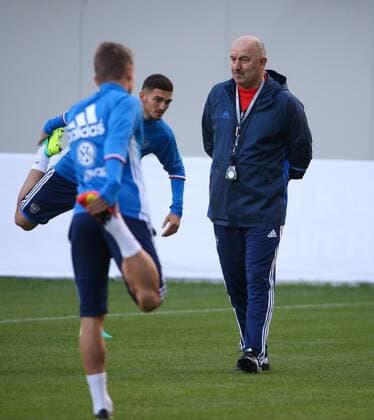 MOSCOW REGION, RUSSIA - AUGUST 29, 2016: The head coach of the Russian national football team, Stanislav Cherchesov (R) during a training session of the Russian national football team at Khimki Arena Stadium ahead of international football friendlies against Turkey and Ghana. Valery Sharifulin TASS  TS02F1DD
