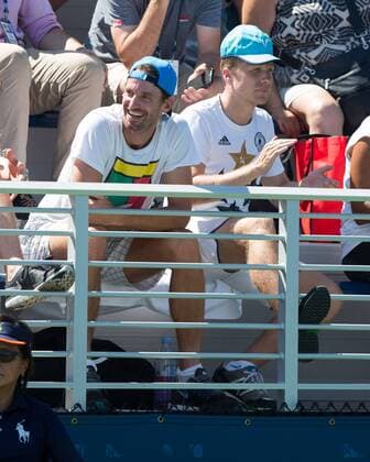 MONA BARTHEL (GER) Trainer Christopher Kas und Oliver Pocher sitzen auf der Tribuene. Tennis - US Open 2016 - Grand Slam ITF ATP Tennis Herren WTA Tennis Damen - Flushing Meadows - New York - New York - USA - 29 August 2016.