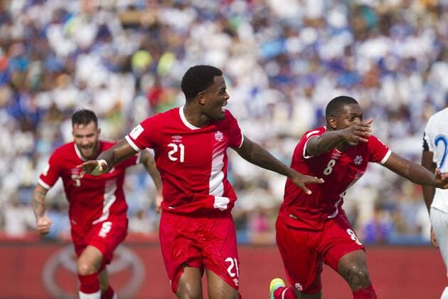 Canadian players Cyle Larin (C) and Doneil Henry celebrate a goal against Honduras during their Russia 2016 qualifying match at the Olympic Stadium of San Pedro Sula, Honduras, 02 September. HONDURAS VS. CANADA !ACHTUNG: NUR REDAKTIONELLE NUTZUNG!  TEG001 20160903-636084594948922329