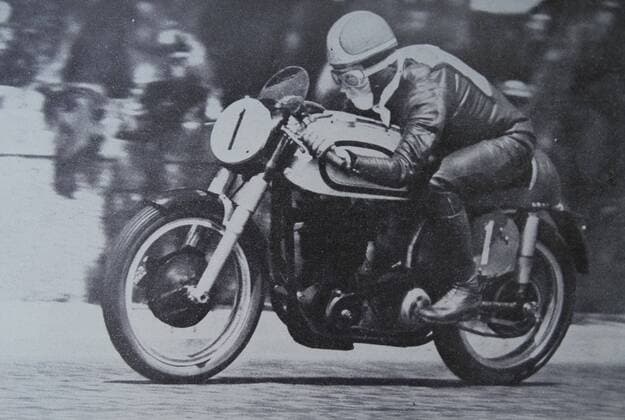 Geoffrey Ernest Duke OBE (born 29 March 1923) is a British multi-time motorcycle Grand Prix road racing world champion. He was born in St. Helens, Lancashire. 1950 UnitedArchives73305974 