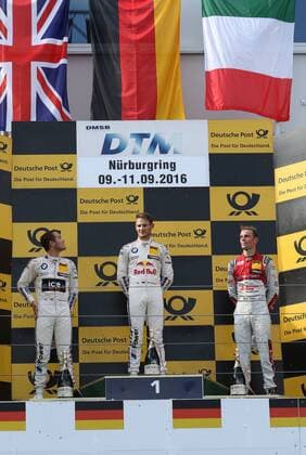 DTM Nürburgring - Falsche Nationalfahne bei der Siegerehrung 10.09.2016 - Marco Wittmann (GER) (BMW Team RMG - BMW M4 DTM) (mitte) siegt beim DTM-Lauf am Nürburgring vor Tom Blomqvist (GB) (BMW Team RBM - BMW M4 DTM) (links) und Jamie Green (GB) (Audi Team Rosberg - Audi RS 5 DTM). Copyright MP-Sport Pakusch