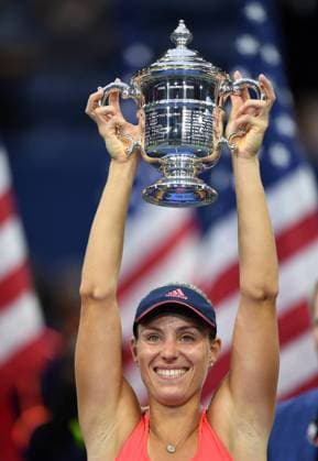 Themen der Woche - SPORT Bilder des Tages - SPORT NEW YORK, Sept. 10, 2016 -- Angelique Kerber of Germany celebrates with the trophy after the women s singles final match against Karolina Pliskova of Czech Republic at the 2016 U.S. Open in New York, the United States, Sept. 10, 2016. Angelique Kerber won 2-1 and claimed the title. ) (SP)U.S.-NEW YORK-TENNIS-U.S. OPEN YinxBogu 