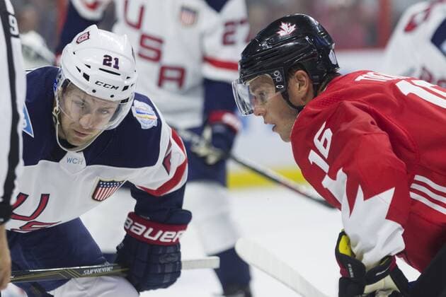 Eishockey, World Cup of Hockey, Kanada - USA September 10, 2016: Team Canada Jonathan Toews (16) and Team USA Derek Stepan (21) ready for the face-off during the World Cup of Hockey game between Team USA and Team Canada at Canadian Tire Centre in Ottawa, ON, Canada. CSM World Cup of Hockey 2016: Team USA vs Team Canada September 10 - ZUMAc04_