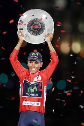 Colombian rider Nairo Quintana, of Movistar team, celebrates on the podium after wining La Vuelta Espana 2016 cycling race, in Madrid, Spain, 11 September 2016. NAIRO QUINTANA WINS LA VUELTA CYCLING RACE !ACHTUNG: NUR REDAKTIONELLE NUTZUNG!  GRA242 20160911-636092283259512941