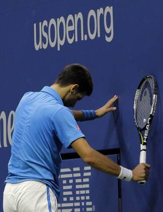Novak Djokovic, of Serbia, reacts to losing a point to Stan Wawrinka, of Switzerland, during their men s championship match in Arthur Ashe Stadium at the 2016 US Open Tennis Championships at the USTA Billie Jean King National Tennis Center in New York City on September 11, 2016.  NYP20160911824 RAYxSTUBBLEBINE