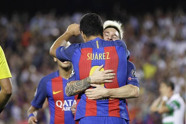 13.09.2016. Nou Camp, Barcelona, Spain. UEFA Champions League Football. Barcelona versus Celtic. Messi celebrating his third goal with Suarez xangelxboludax  ActionPlus11788992