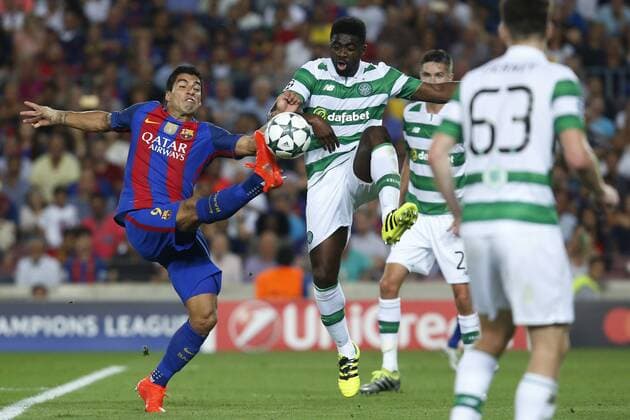 (160914) -- BARCELONA, Sept. 13, 2016 -- Barcelona s Luis Suarez (L) vies for the ball during the UEFA Champions League Group C match between Barcelona and Celtic in Barcelona, Sept. 13, 2016. Barcelona won 7-0. ) (SP)SPAIN-BARCELONA-SOCCER-UEFA CHAMPIONS LEAGUE-GROUP C PauxBarrena 