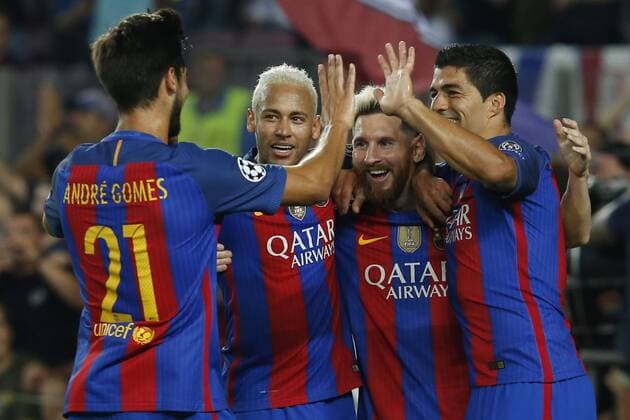 (160914) -- BARCELONA, Sept. 13, 2016 -- Barcelona s Lionel Messi (2nd R) celebrates scoring with Luis Suarez (1st R), Neymar (3rd R) and Andre Gomez (1st L) during the UEFA Champions League Group C match between Barcelona and Celtic in Barcelona, Sept. 13, 2016. Barcelona won 7-0. ) (SP)SPAIN-BARCELONA-SOCCER-UEFA CHAMPIONS LEAGUE-GROUP C PauxBarrena 