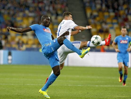 September 13, 2016 - Kiev, Ukraine - JUNIOR MORAES (R) of Dynamo vies for the ball against KALIDOU KOULIBALY (L) of Napoli,during the UEFA Champions League,group B, soccer match between Dynamo Kyiv and SSC Napoli,at the Olimpiyskiy stadium,in Kiev, Ukraine, on13 September,2016. SOCCER2016 - FC Dynamo Kyiv v SSC Napoli - UEFA Champions League - ZUMAg194
