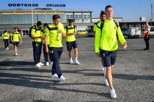 Gent s Rob Schoofs, Gent s Siebe Horemans and Gent s Thomas Foket pictured at the departure of Belgian first league soccer team KAA Gent for Braga in Portugal, Wednesday 14 September 2016, in Oostende airport. Tomorrow Gent is playing the first game of the group stage of the Europa League competition against SC Braga, in the group H. LUCxCLAESSEN  x04931168x