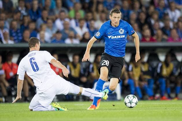 Leicester s Robert Huth and Club s Hans Vanaken fight for the ball during a game of the first day of the group stage of the UEFA Champions League competition between Belgian first division soccer team Club Brugge KV and English club Leicester City F.C. in the group G in Brugge, Wednesday 14 September 2016. JASPERxJACOBS  x04931701x