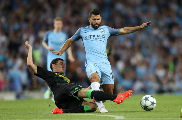 Football - 2016 2017 Champions League - Group C : Manchester City v Borussia Monchengladbach - The Etihad Stadium Sergio Aguero of Manchester City is tackled by Andreas Christensen of Borussia Monchengladbach during the match between Manchester City and Borussia Monchengladbach at The Etihad Stadium COLORSPORT LYNNE CAMERON 