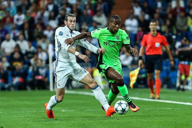 Real Madrid s Garet Bale and Sporting Clube de Portugal s Marvin Zeegelaar during the match of Champions League group 6 round 1, between Real Madrid an Sporting Clube de Portugal at Santiago Bernabeu Stadium in Madrid September 14, 2016.  (20160914027)