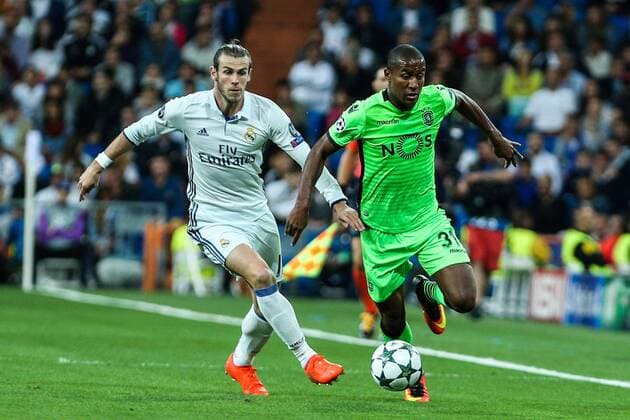 Real Madrid s Garet Bale and Sporting Clube de Portugal s Marvin Zeegelaar during the match of Champions League group 6 round 1, between Real Madrid an Sporting Clube de Portugal at Santiago Bernabeu Stadium in Madrid September 14, 2016.  (20160914028)