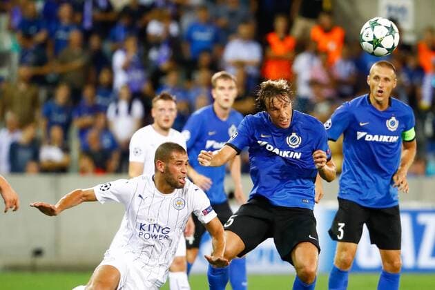 Leicester s Islam Slimani and Club s Pina Tomas fight for the ball during a game of the first day of the group stage of the UEFA Champions League competition between Belgian first division soccer team Club Brugge KV and English club Leicester City F.C. in the group G in Brugge, Wednesday 14 September 2016. KURTxDESPLENTER  x04931862x