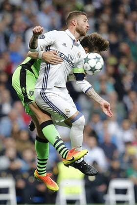 Real Madrid s Ramos and Sporting s defender Sebastian Coates during Champions League match on September 14, 2016 at Santiago Bernabeu Stadium in Madrid, Spain. Photo: Cesar Cebolla ALFAQUI 