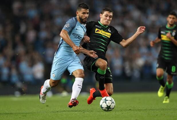 Football - 2016 2017 Champions League - Group C : Manchester City v Borussia Monchengladbach - The Etihad Stadium Sergio Aguero of Manchester City and Andreas Christensen of Borussia Monchengladbach during the match between Manchester City and Borussia Monchengladbach at The Etihad Stadium COLORSPORT LYNNE CAMERON 