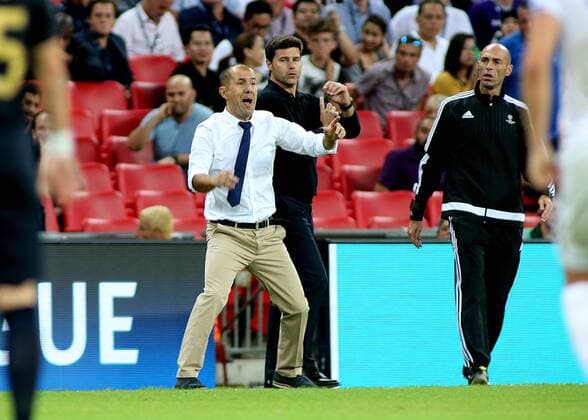 14.09.2016. Wembley Stadium, London, England. UEFA Champions League Football. Tottenham Hotspur versus Monaco. Tottenham Hotspur Manager Mauricio Pochettino and AS Monaco Manager Leonardo Jardim bump into each other in the technical area xMarkxKertonx  ActionPlus11789567
