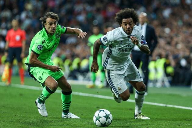 Fußball, CL, Real Madrid - Sporting Lissabon Sporting Clube de Portugal s Lazar Markovic and Real Madrid s Marcelo Vieira during the match of Champions League group 6 round 1, between Real Madrid an Sporting Clube de Portugal at Santiago Bernabeu Stadium in Madrid September 14, 2016.  (20160914067)