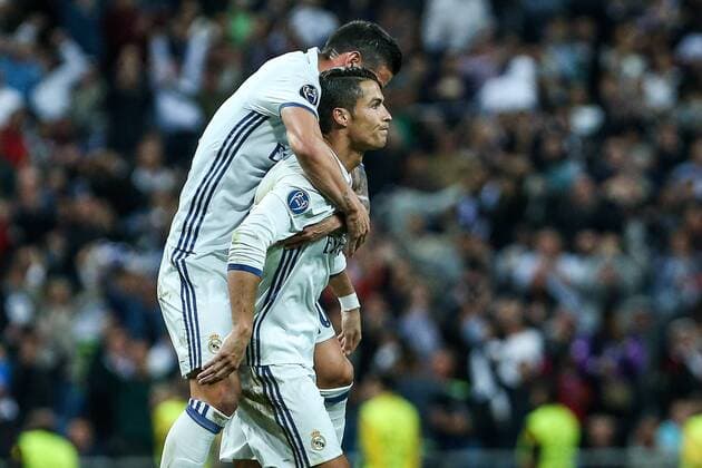 Fußball, CL, Real Madrid - Sporting Lissabon Real Madrid s Cristiano Ronaldo and James Rodriguez during the match of Champions League group 6 round 1, between Real Madrid an Sporting Clube de Portugal at Santiago Bernabeu Stadium in Madrid September 14, 2016.  (20160914092)