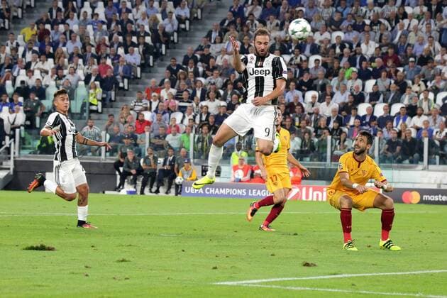 Italy: Juventus FC drew 0-0 with Sevilla FC Gonzalo Higuain (Juventus) in action during the Champions League football match between Juventus FC and Sevilla FC. Juventus FC drew 0-0 with Sevilla FC.  MassimilianoxFerraro PacificxPress
