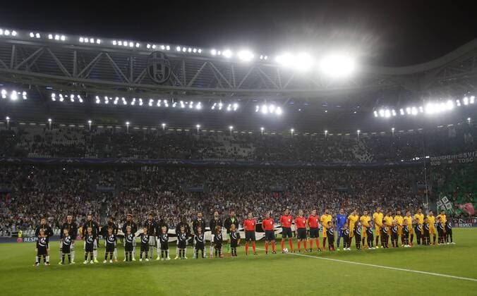 Italy Soccer Champions League: Juventus and Sevilla draw a scoreless tie Juventus and Sevilla teams line up prior to start of their Group H Champions League soccer match at the Juventus Stadium. The game ended 0-0.  IsabellaxBonottox xPacificxPress