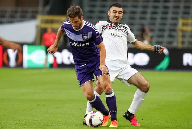 Anderlecht s Alexandru Chipciu and Gabala s Rashad A. Sadygov fight for the ball during a soccer game between Belgian team RSC Anderlecht and Azerbaidjan club Gabala FK, Thursday 15 September 2016 in Brussels, the first game of the group stage of the Europa League competition in group C. VIRGINIExLEFOUR  x04932510x