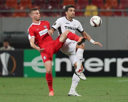 SOCCER - EL, Giurgiu vs A.Wien BUCHAREST,ROMANIA,15.SEP.16 - SOCCER - UEFA Europa League, group stage, Astra Giurgiu vs FK Austria Wien. Image shows Petar Filipovic (A.Wien) and Daniel Niculae (Astra Giurgiu). GEPAxpictures xChristianxOrt