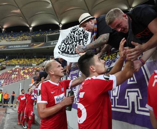 SOCCER - EL, Giurgiu vs A.Wien BUCHAREST,ROMANIA,15.SEP.16 - SOCCER - UEFA Europa League, group stage, Astra Giurgiu vs FK Austria Wien. Image shows the rejoicing of Raphael Holzhauser and Tarkan Serbest (A.Wien). GEPAxpictures xChristianxOrt