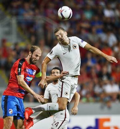 Roman Hubnik of Viktoria Pilsen, left, and Edin Dzeko of As Roma, right, in action during the UEFA Europe League, group E, 1st round match FC Viktoria Plzen vs AS Roma, in Pilsen, Czech Republic, on Thursday, September 15, 2016. (CTKxPhoto MiroslavxChaloupka) CTKPhotoP201609151030801  CHA 11