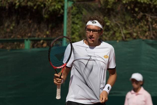 World group , play-off play-off round Uzbekistan Vs Switzerland (IN WHITE )Denis ISTOMIN from uzb - (in red )Antoine BELLIER frome swis 