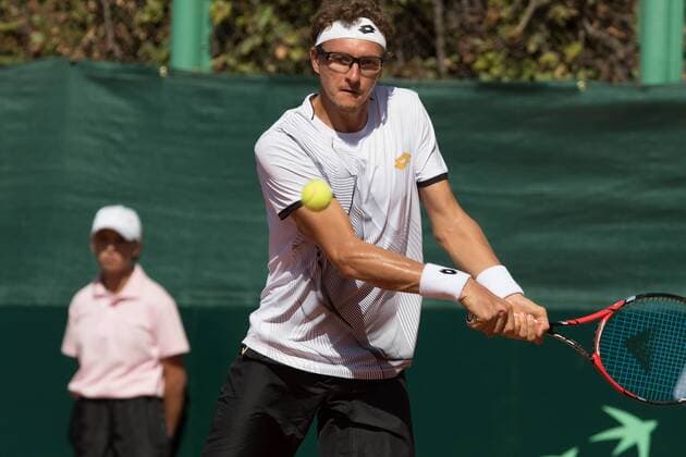 World group , play-off play-off round Uzbekistan Vs Switzerland (IN WHITE )Denis ISTOMIN from uzb - (in red )Antoine BELLIER frome swis 