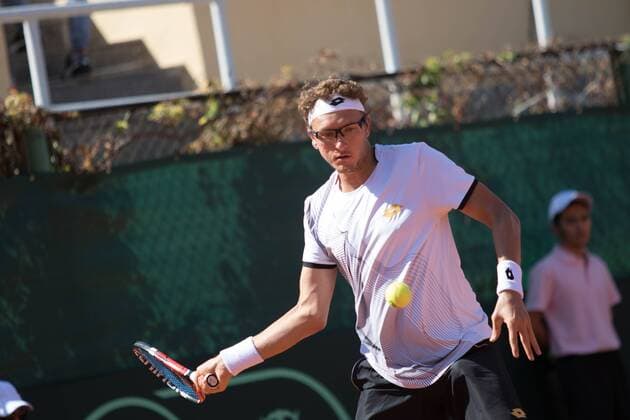 World group , play-off play-off round Uzbekistan Vs Switzerland (IN WHITE )Denis ISTOMIN from uzb - (in red )Antoine BELLIER frome swis 