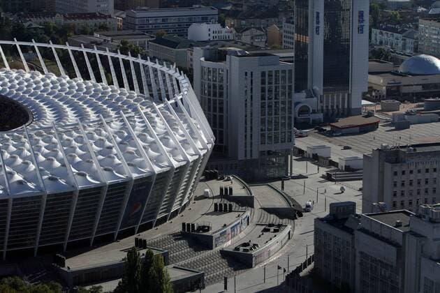September 15, 2016 - Kiev, Ukraine - A NSK Olimpiyskyi stadium bowl is seen over the Kyivs city buildings. Ukrainian capital Kyiv city has been selected to host the 2018 UEFA Champions League final, the first European Cup decider to be held in Ukraine. The decision was taken at Thursday s UEFA Executive Committee meeting in Athens, September 15, 2016. Kyiv to host 2018 Champions League final  - ZUMAn230
