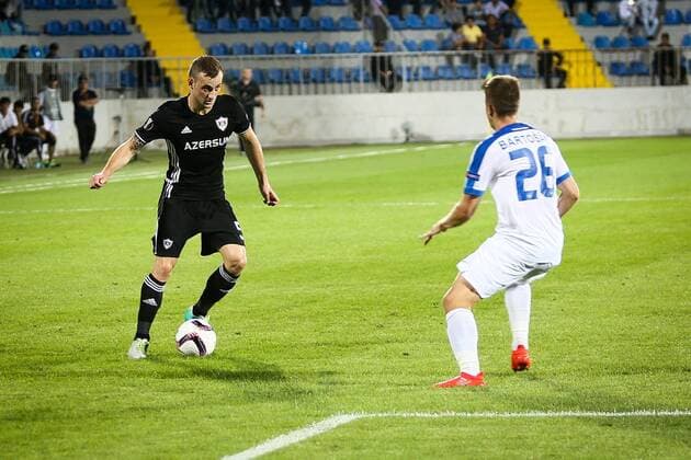 UEFA: Qarabag FK - Slovan Liberec Slovan Liberec Lukas Bartosak (R) vies with Qarabag s Maksim Medvedev (L) during the UEFA Europa League group J footbal match Qarabag vs Slovan Liberec at Dalga Arena stadium. The final score is 2-2.  AzizxKarimovx xPacificxPress