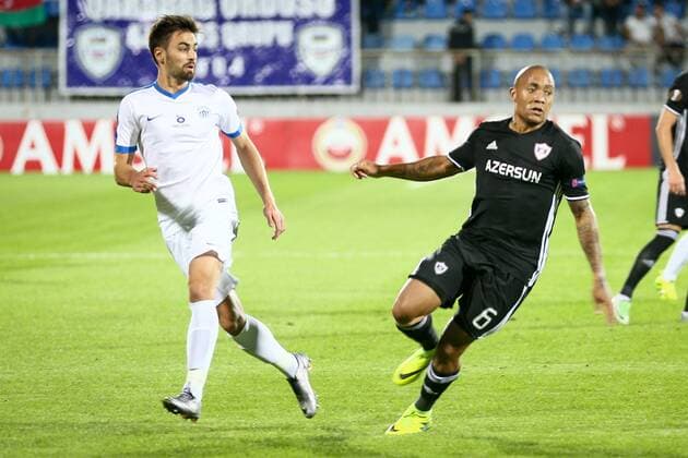 UEFA: Qarabag FK - Slovan Liberec Slovan Liberec player vies with Qarabag s Dino Ndlovu (R) during the UEFA Europa League group J football match Qarabag vs Slovan Liberec at Dalga Arena stadium. The final score is 2-2.  AzizxKarimovx xPacificxPress