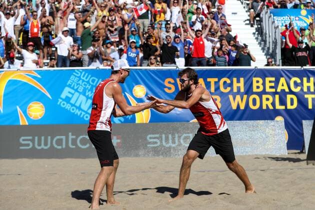BEACHVOLLEYBALL - FIVB World Tour Finals TORONTO,CANADA,16.SEP.16 - Beach volleyball Beachvolleyball - FIVB World Tour 2016, Finals. Image shows the rejoicing of Ben Saxton and Chaim Schalk (CAN). GEPAxpictures xMaticxKlansek
