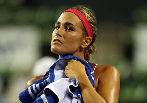 September 19, 2016, Tokyo, Japan - Rio de Janeiro Olympics gold medalist Monica Puig of Puerto Rico wipes swet during the first round of the Toray Pan Pacific Open tennis championships in Tokyo on Monday, September 19, 2016. Puig defeated Varvara Lepchenko of the United States 6-0, 6-3. Noxthirdxpartyxsales  (lwxa004673)