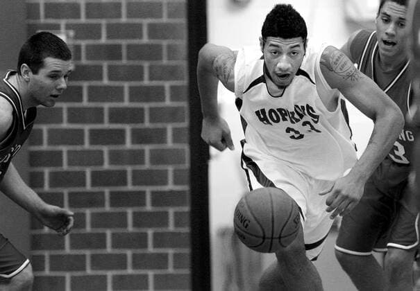 CARLOS GONZALEZ ¢ cgonzalez@startribune.com February 18, 2009 Plymouth, MN - Armstrong High Hopkins High School Basketball - Looking to focus exclusively on Hopkins in its game against Armstrong. We are working on a feature on Hopkins, arguably the most talented team in state history but also a team that faces harsh criticism from outside sources for having so few players on its team that are actually from the Hopkins district. Also, some shots of Hopkins head coach Ken Novak jr., his father Ken sr. (assistant coach) and also the Armstrong coach would be great (Armstrong coach is quoted in the story). Hopkins Royce White (33) during Tuesday night™s game vs. Armstrong High. February 17, 2009 - ZUMAm42_