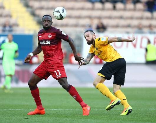 Jacques Zoua (1.FC Kaiserslautern) im Zweikamp mit Giuliano Modica (SG Dynamo Dresden), 1.FC Kaiserslautern vs SG Dynamo Dresden, Fussball, 2. Bundesliga, 21.09.2016, Foto Neis Eibner Kaiserslautern Copyright: xNeisx Eibner-Pressefotox EP_ans