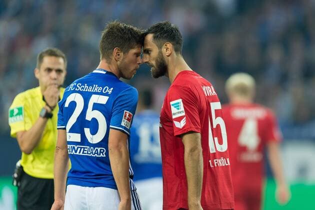 Gelsenkirchen, Germany 09.09.2016, 1.Bundesliga 4. Spieltag, FC Schalke 04 - 1.FC Koeln, Klaas-Jan HUNTELAAR (S04) gegen Mergim Mavraj (Koeln) ( DeFodi001
