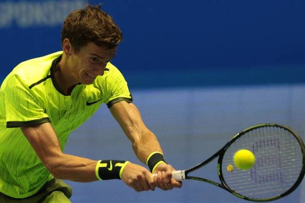 September 22, 2016 - Saint Petersburg, Russia - Andrey Kuznetsov of Russia returns the ball to Tomas Berdych of Czech Republic during the St. Petersburg Open ATP Tennis Herren tennis tournament match in St. Petersburg, Russia, September 22, 2016. St. Petersburg Tennis Open 2016  - ZUMAn230
