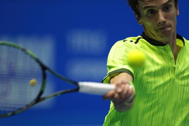 September 22, 2016 - Saint Petersburg, Russia - Andrey Kuznetsov of Russia returns the ball to Tomas Berdych of Czech Republic during the St. Petersburg Open ATP Tennis Herren tennis tournament match in St. Petersburg, Russia, September 22, 2016. St. Petersburg Tennis Open 2016  - ZUMAn230