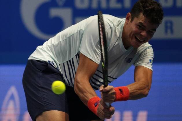 September 22, 2016 - Saint Petersburg, Russia - Milos Raonic of Canada returns the ball to Mikhail Youzhny of Russia during the St. Petersburg Open ATP Tennis Herren tennis tournament match in St. Petersburg, Russia, September 22, 2016. St. Petersburg Tennis Open 2016 - Mikhail Youzhny v Milos Raonic  - ZUMAn230