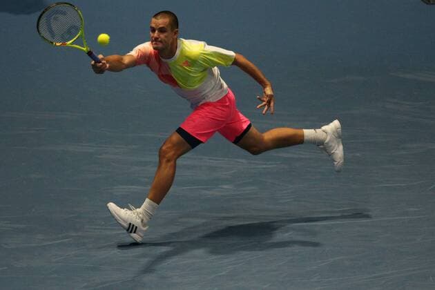 September 22, 2016 - Saint Petersburg, Russia - Mikhail Youzhny of Russia returns the ball to Milos Raonic of Canada during the St. Petersburg Open ATP Tennis Herren tennis tournament match in St. Petersburg, Russia, September 22, 2016. St. Petersburg Tennis Open 2016 - Mikhail Youzhny v Milos Raonic  - ZUMAn230