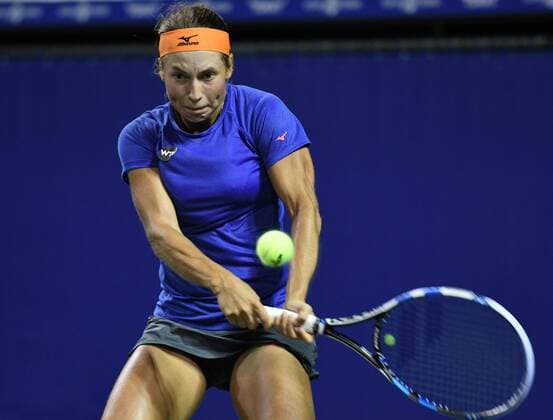 September 22, 2016, Tokyo, Japan - Yulia Putintseva of Kazakhstan returns the ball against Magda Linette of Poland during the second round of the Toray Pan Pacific Open tennis championships in Tokyo on Thursday, September 22, 2016. Noxthirdxpartyxsales  (lwxa004779)